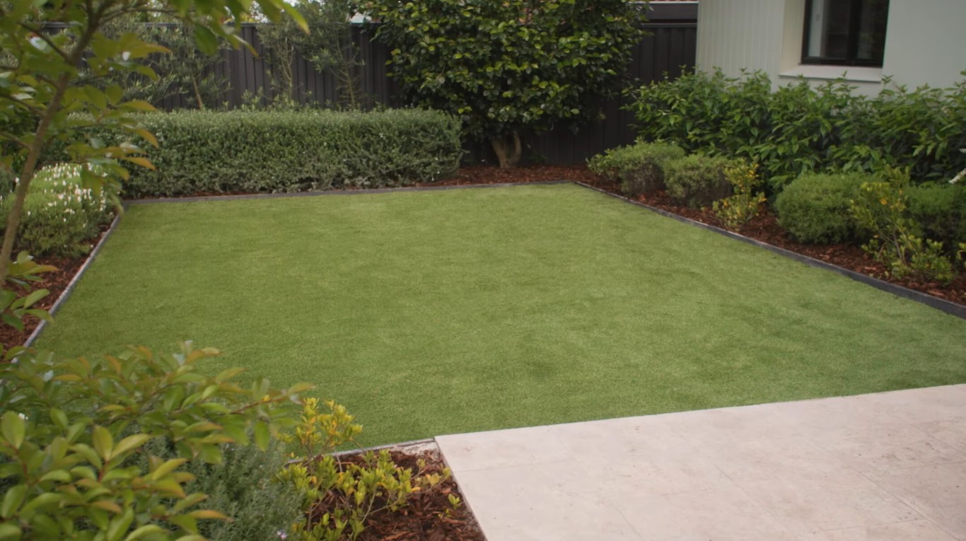 Professional artificial grass installation in Frederick, MD backyard
